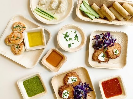 Palm leaf plates and bowls set for disposable eco-friendly dining
