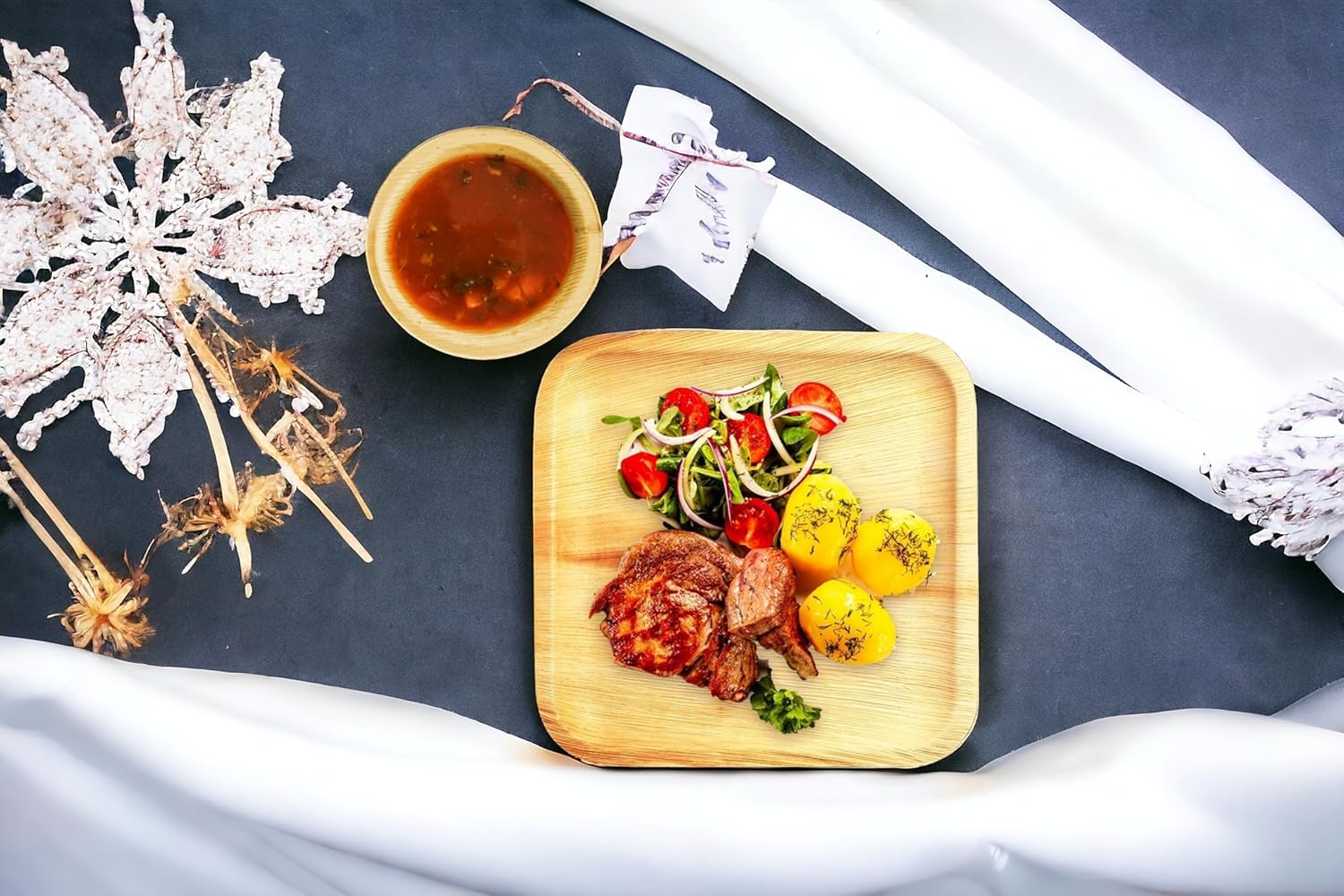 Compostable palm leaf plates and bowls for catering events
